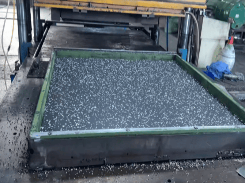 Extracting cleaning chemical slurry from rubber floors using a wet vacuum